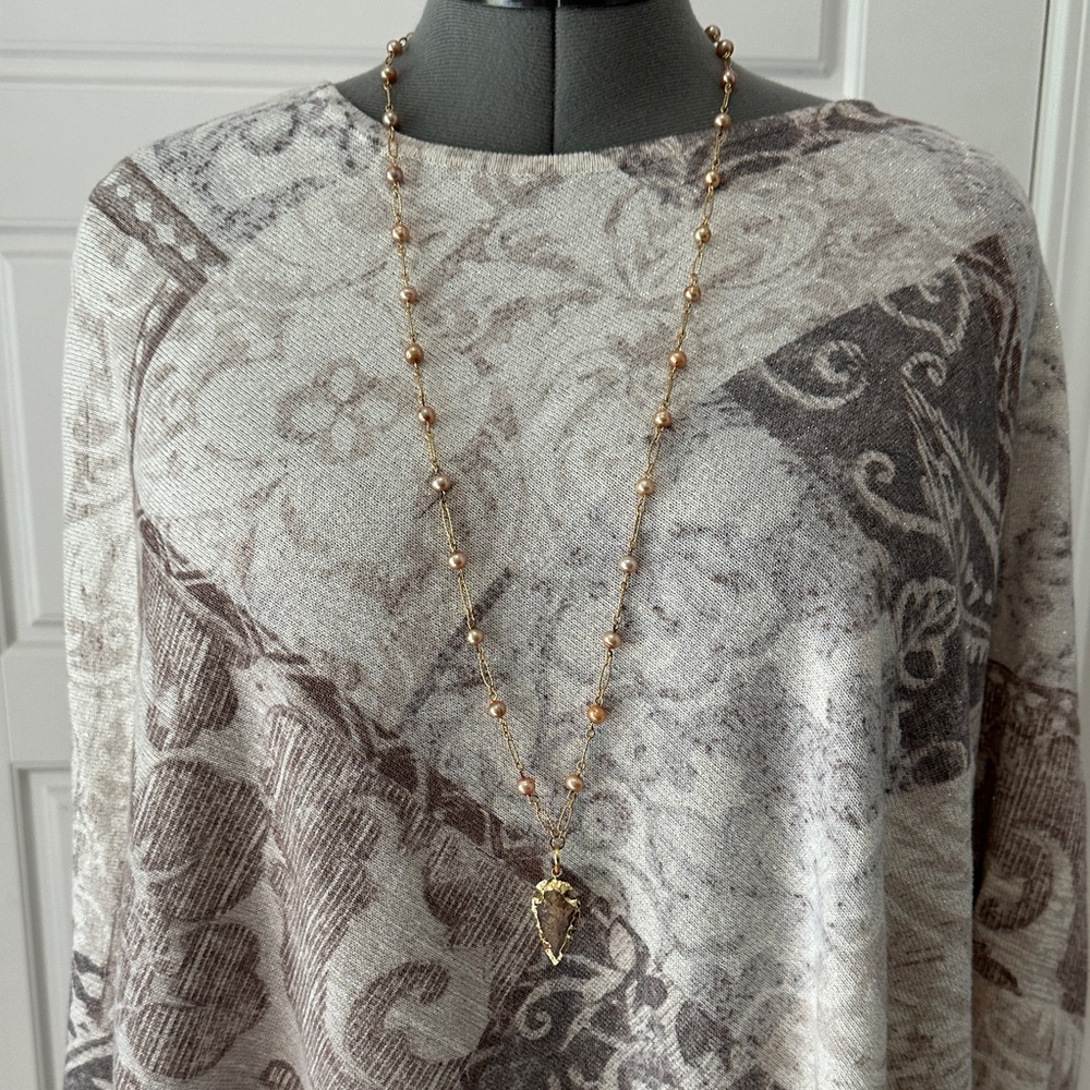 Elegant Gold and Brown Necklace